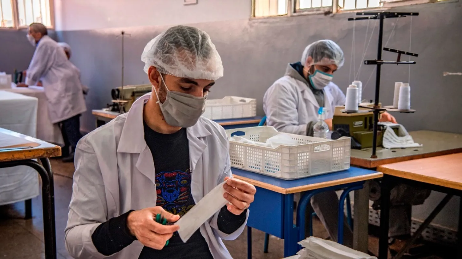 Some one hundred inmates in around 20 Moroccan prisons are making 20,000 masks a day. (AFP)