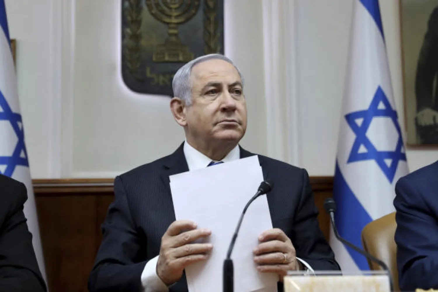 FILE - In this Feb. 16, 2020, file, photo, Israeli Prime Minister Benjamin Netanyahu chairs the weekly cabinet meeting, in Jerusalem. An Israeli court on Wednesday, May 20, 2020 ordered Prime Minister Benjamin Netanyahu to appear for the opening of his criminal trial in Jerusalem on Sunday. (Gali Tibbon/Pool via AP, File)
