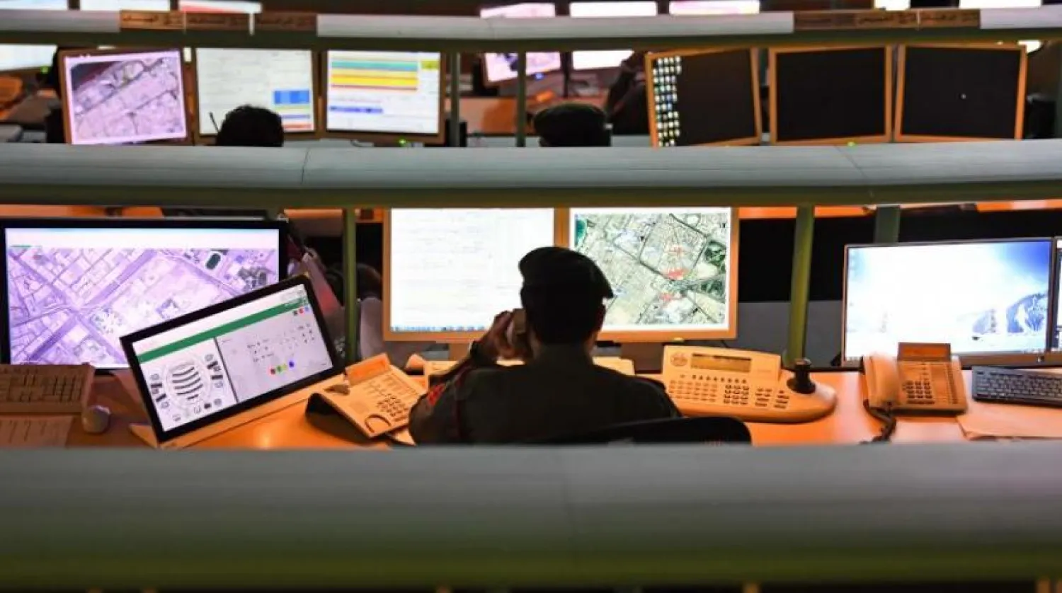 UAE security officers monitoring street movement. AFP 