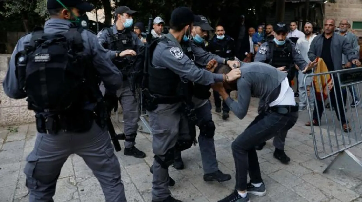 Israeli forces attacking one of the worshipers. AFP 