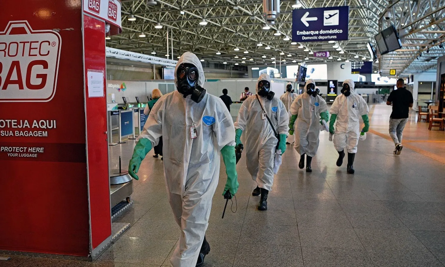 Navy soldiers are seen after carrying out a disinfection operation against COVID-19 at Tom Jobim Galeao International Airport in Rio de Janeiro, Brazil, on April 24, 2020. (AFP)
