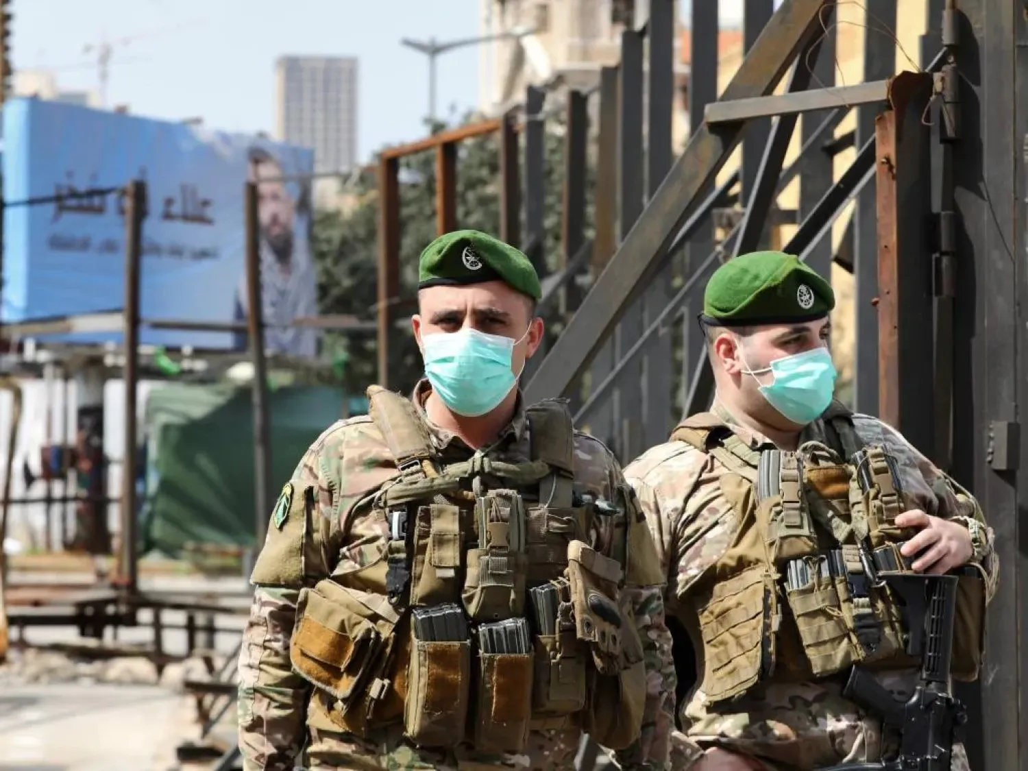 Lebanese soldiers standing guard in the downtown district of the capital Beirut wear protective masks against the coronavirus, on March 15, 2020. (AFP)