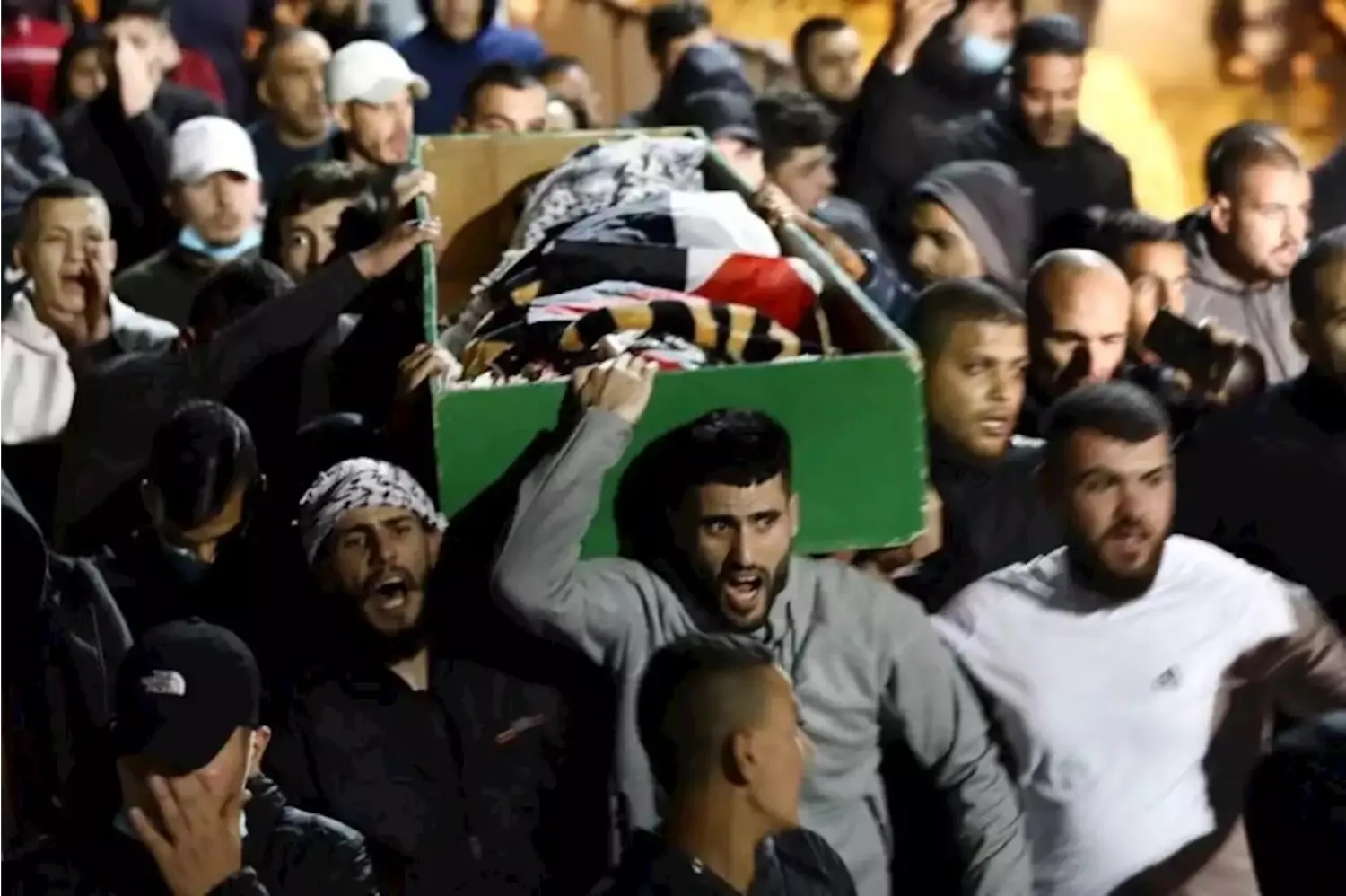 People attend the funeral of Iyad Khayri in Jerusalem on May 31, 2020. (Reuters)