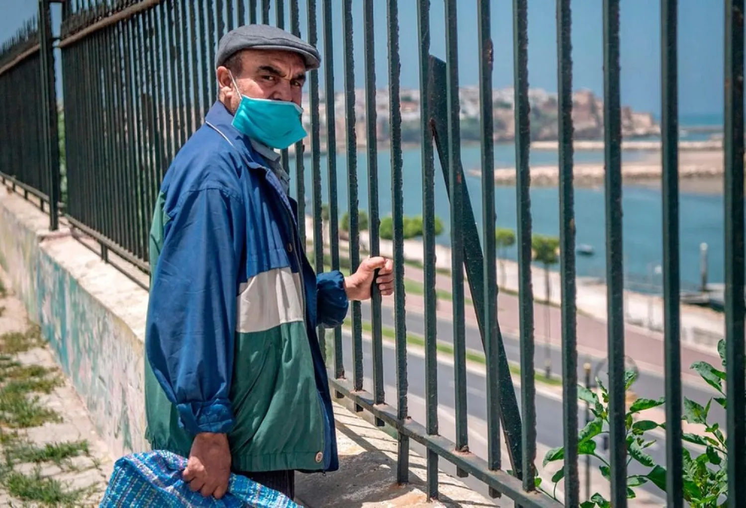 A taxi driver looks on before getting tested for the coronavirus in Morocco's capital Rabat. (AFP)