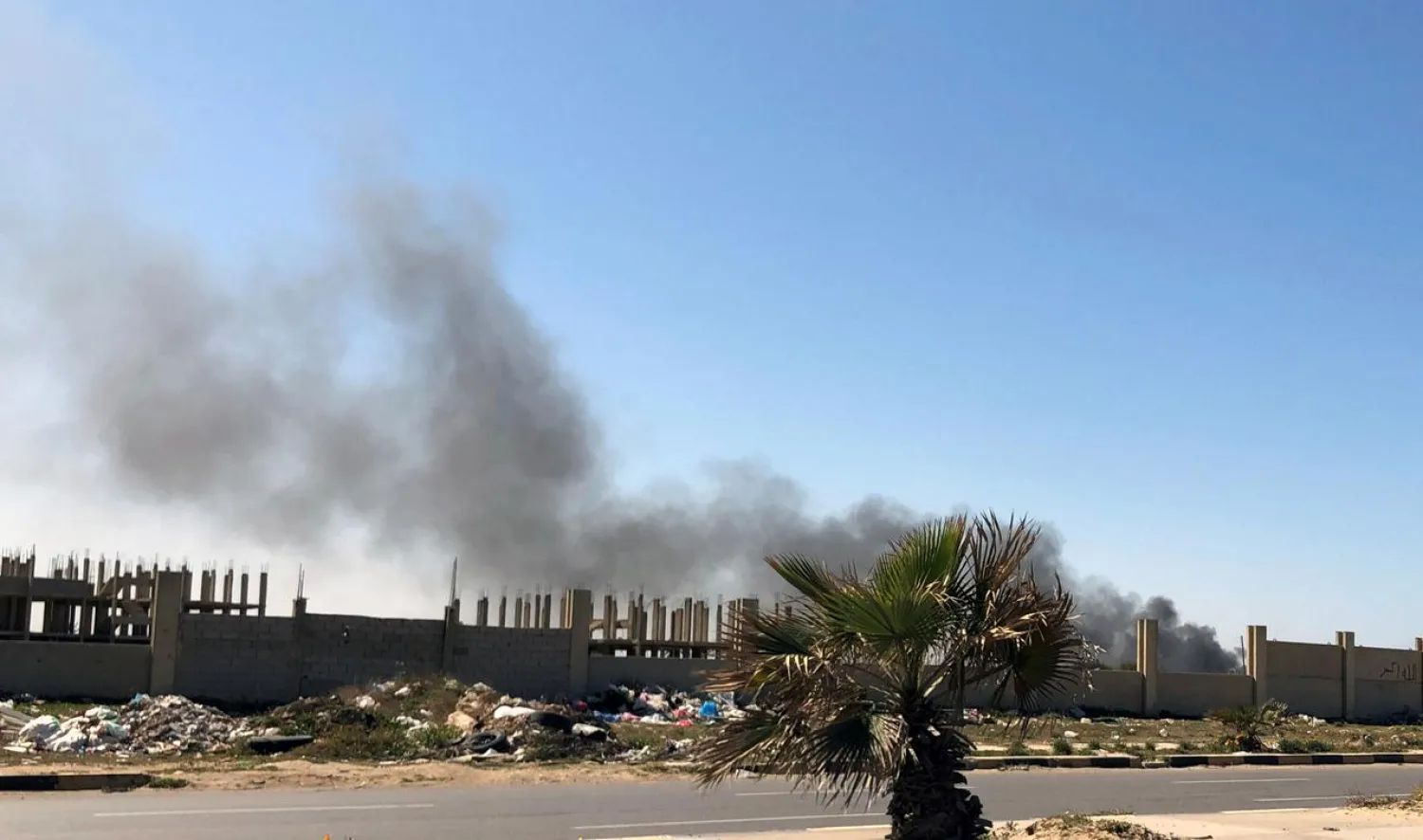 Smoke rises from Mitiga Airport after being attacked in Tripoli, Libya February 28, 2020. (Reuters)