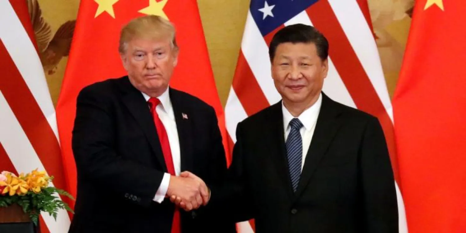 ترمب ونظيره الصيني في بكين (أرشيفية - رويترز)