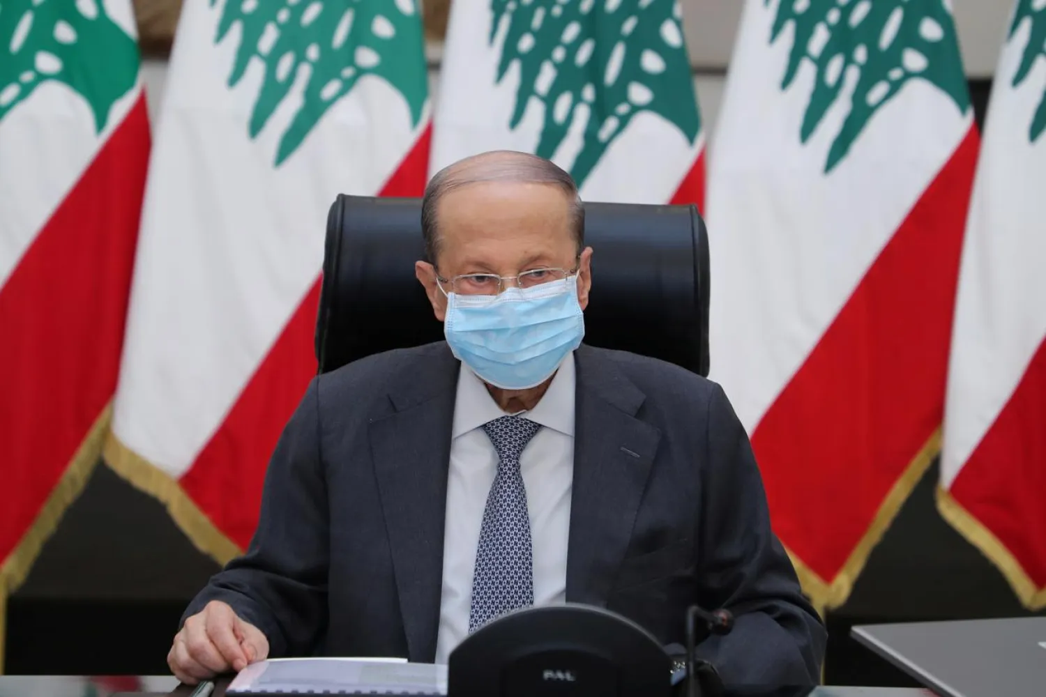 Lebanon’s President Michel Aoun wearing a face mask, heads a council of ministers meeting at the presidential palace in Baabda, Lebanon April 30, 2020. (Reuters)