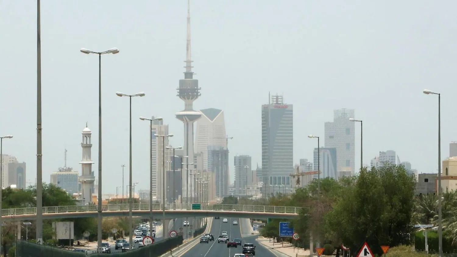 Vehicles drive down a highway in the Kuwaiti capital Kuwait City on May 31, 2020, after authorities eased some of the restrictive measures put in place during the coronavirus pandemic crisis. AFP