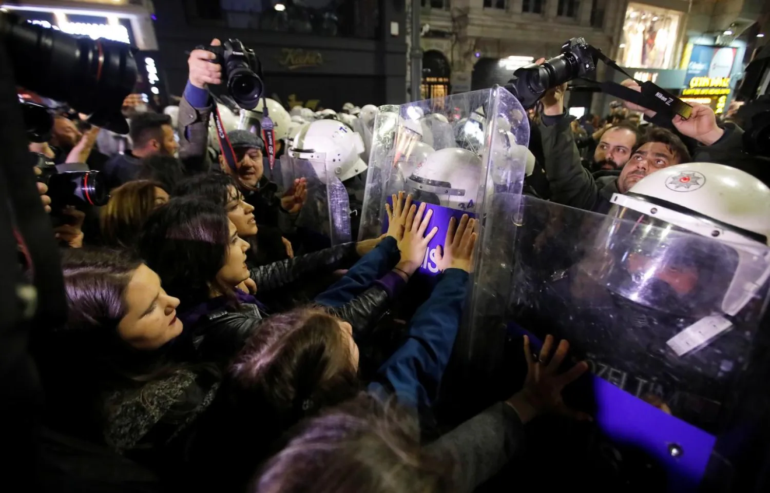 Police try to disperse a march marking International Women's Day in Istanbul, Turkey, March 8, 2019. REUTERS/Kemal Aslan