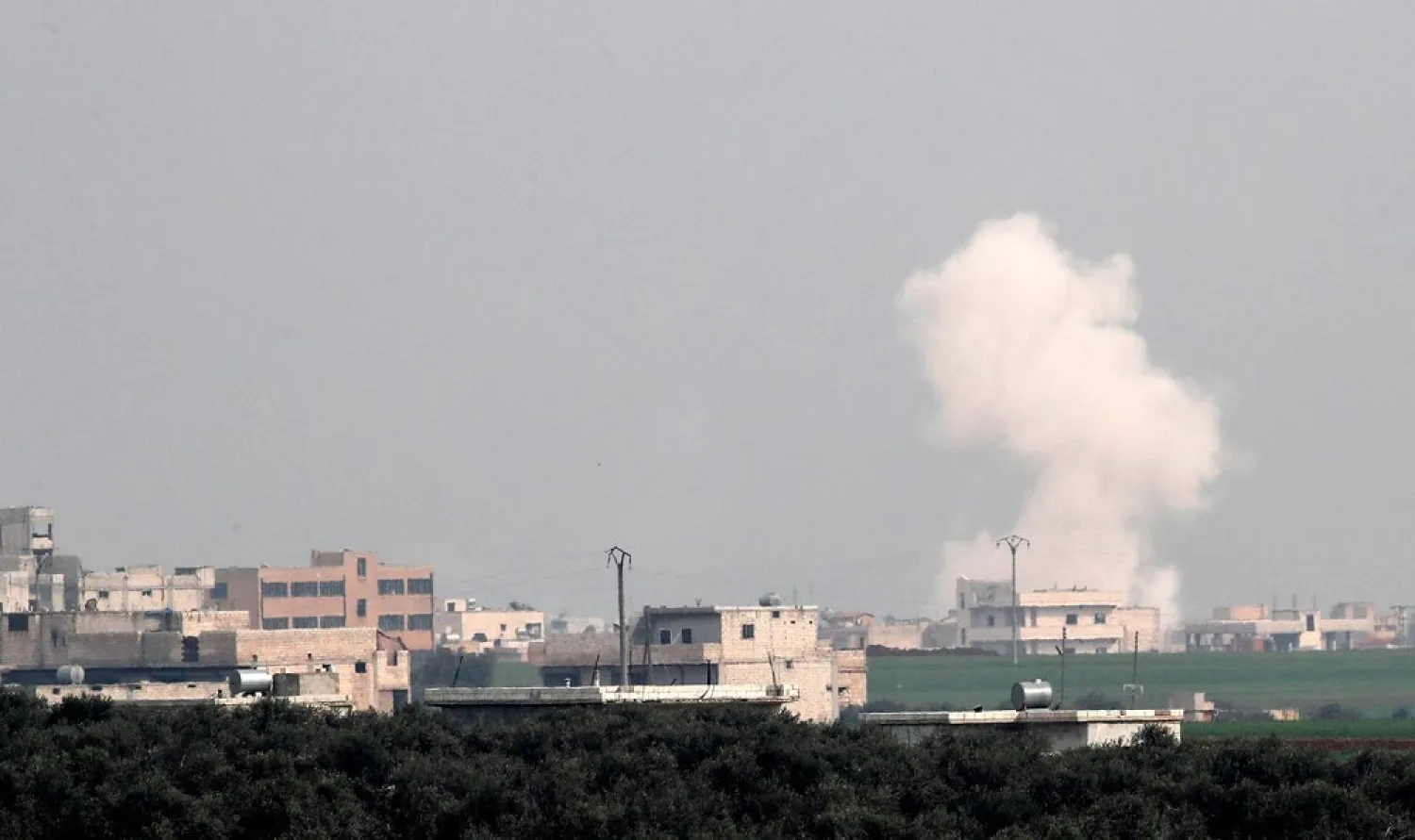 Smoke rises after an air strike in Saraqeb in Idlib province, Syria February 28, 2020. (Reuters)
