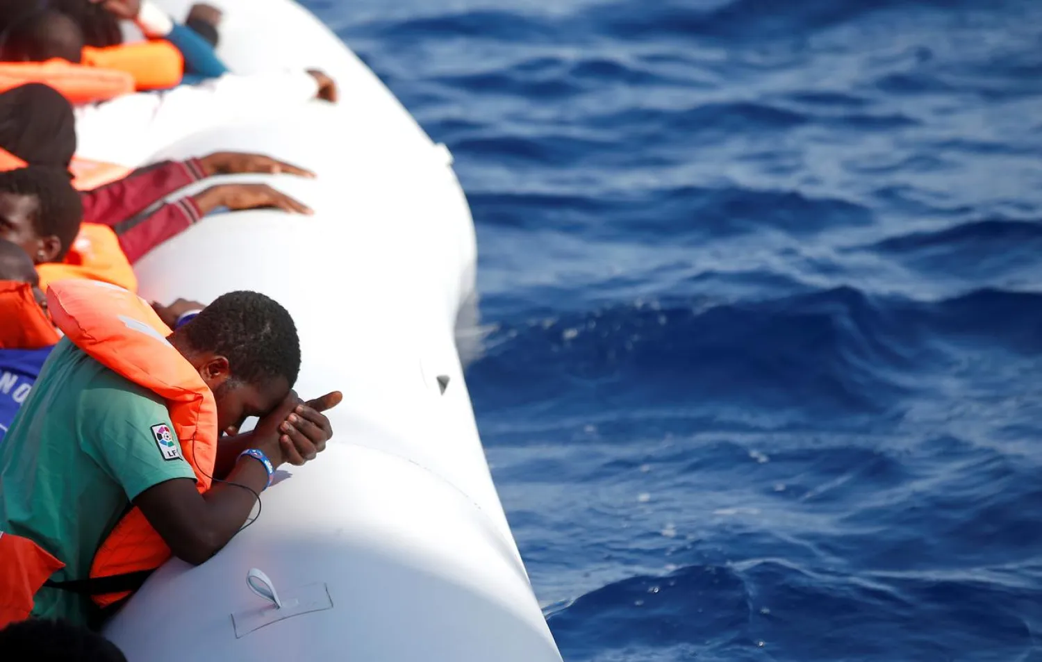 Migrants are seen during rescue operation in the Mediterranea Sea October 20, 2016. Yara Nardi/Italian Red Cross press office/Handout via Reuters