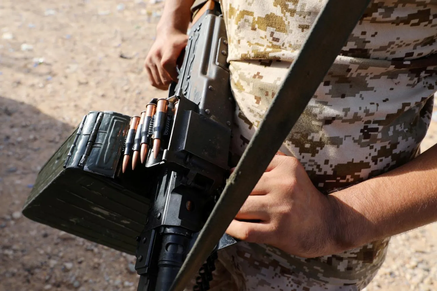 A member of the GNA carries a weapon in Ain Zara, Tripoli, Libya October 14, 2019. (Reuters)