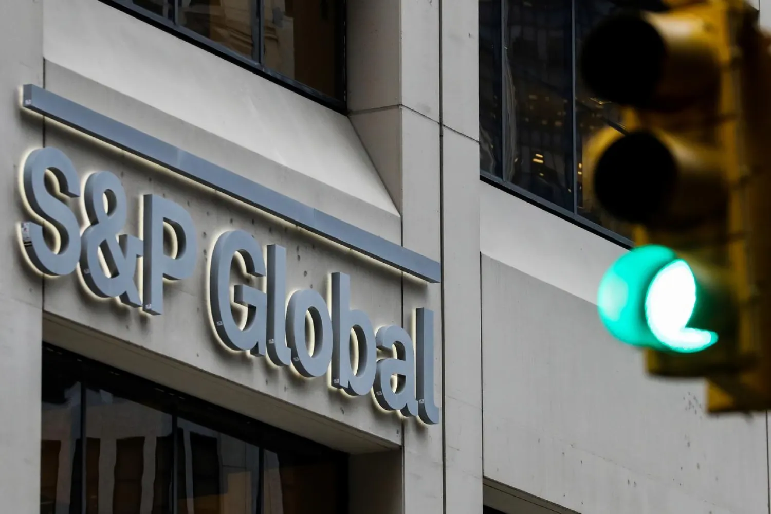 The S&P Global logo is displayed on its offices in the financial district in New York City, US, December 13, 2018. (Reuters)
