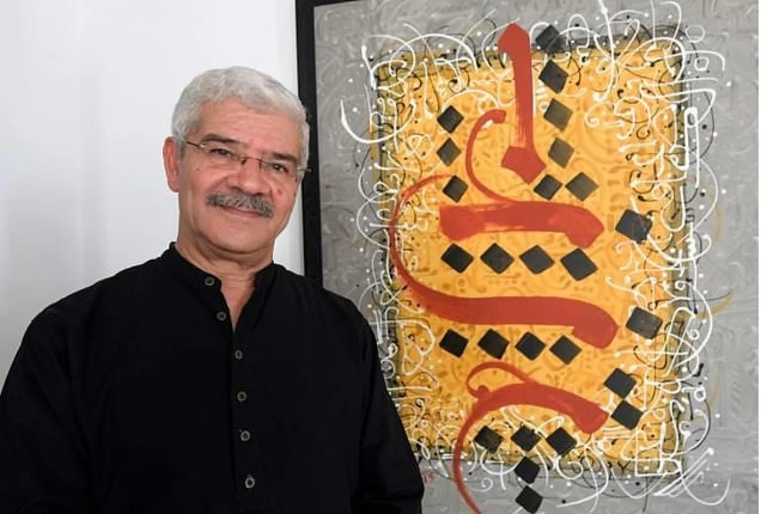 Omar Jomni said calligraphy in Tunisia suffered from 'the brutal and chaotic marginalisation of Islamic culture during the '60s' - AFP