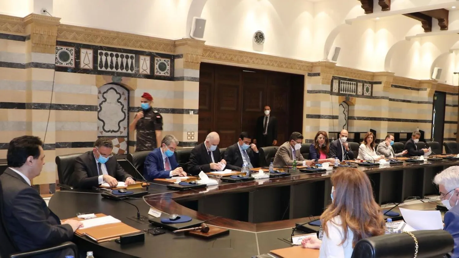 Lebanese Prime Minister Hassan Diab chairs an emergency cabinet session after violent protests over the fall in value of the local currency. Dalati and Nohra via AFP