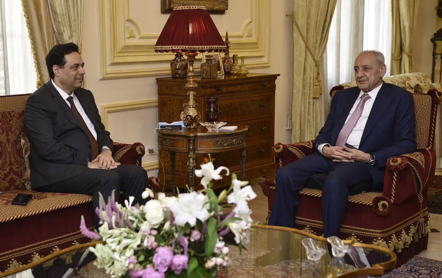 Parliament Speaker Nabih Berri (R) meets Prime Minister Hassan Diab on Friday. (NNA)