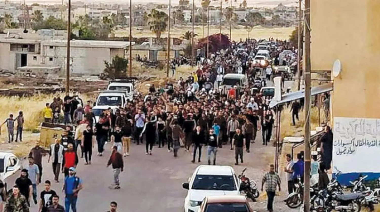 Civilians and members of the Russian-established fifth brigade participated Sunday in a mass demonstration against the Syrian regime, Iran and Hezbollah in the city of Basra al-Sham in the eastern countryside of Daraa. The Syrian Observatory for Human Rights
