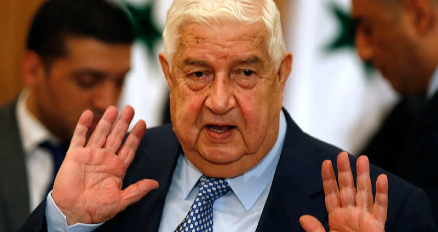 وزير الخارجية السوري وليد المعلم خلال المؤتمر الصحافي في دمشق أمس (أ.ف.ب)