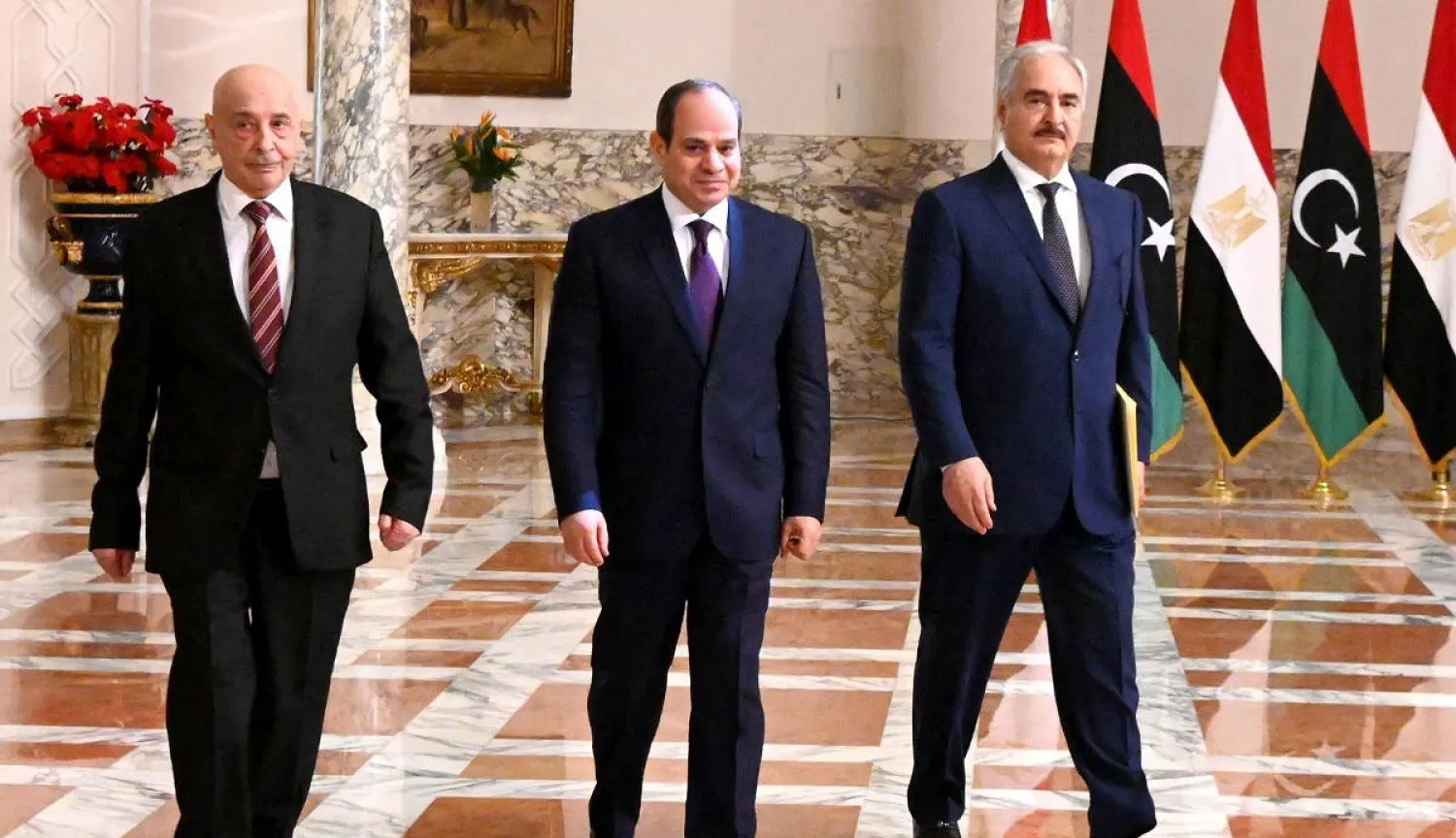 A handout picture released by the Egyptian Presidency on June 6, 2020 shows Egyptian President Sisi (C), LNA Chief Khalifa Haftar (R) and the Libyan parliament Speaker Aguila Saleh in Cairo. (AFP)