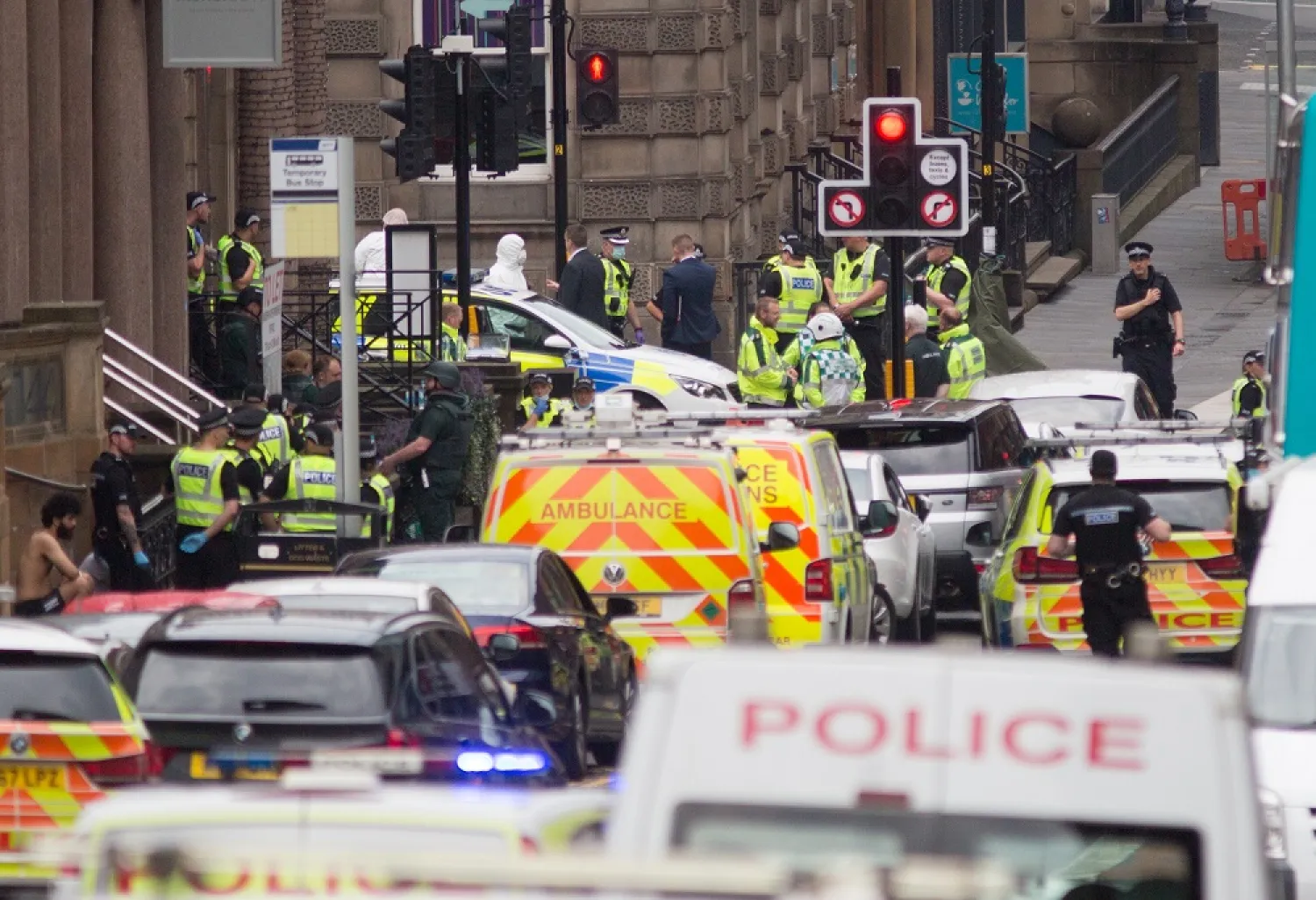 Police attend the scene of a fatal stabbing incident at the Park Inn Hotel in central Glasgow. (AFP)
