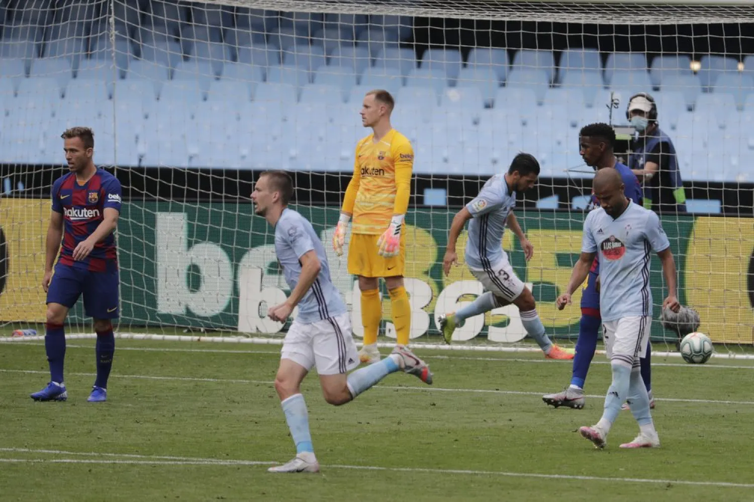 Celta Vigo's Iago Aspas, not in picture, scores his side's second goal during a Spanish La Liga match between RC Celta and Barcelona at the Balaidos stadium in Vigo, Spain, Saturday, June 27, 2020. (AP)