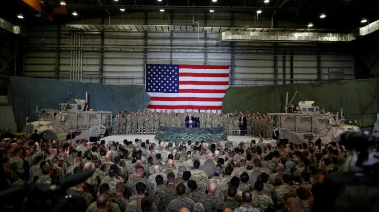 ABD Başkanı Donald Trump geçen yıl Afganistan'daki askeri üste ABD kuvvetlerine sürpriz bir ziyarette bulundu (Reuters)
