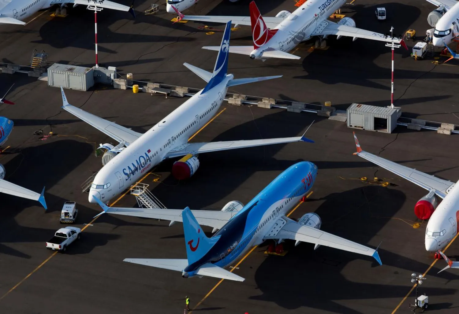 FILE PHOTO: Boeing 737 Max aircraft are parked in a parking lot at Boeing Field in this aerial photo over Seattle, Washington, U.S. June 11, 2020. REUTERS/Lindsey Wasson
