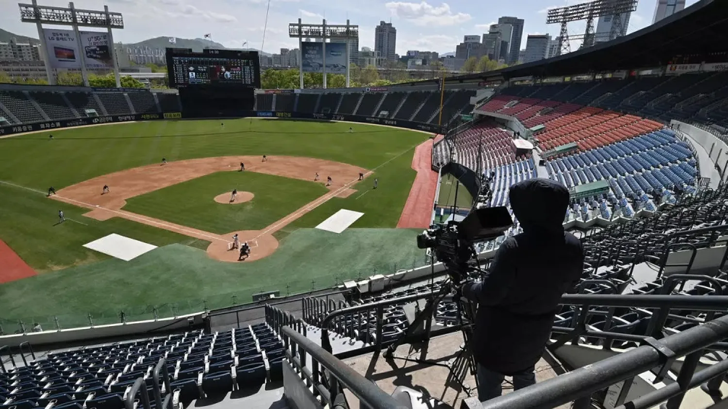 Some professional sports in South Korea -- including baseball -- started new seasons behind closed doors. (AFP)