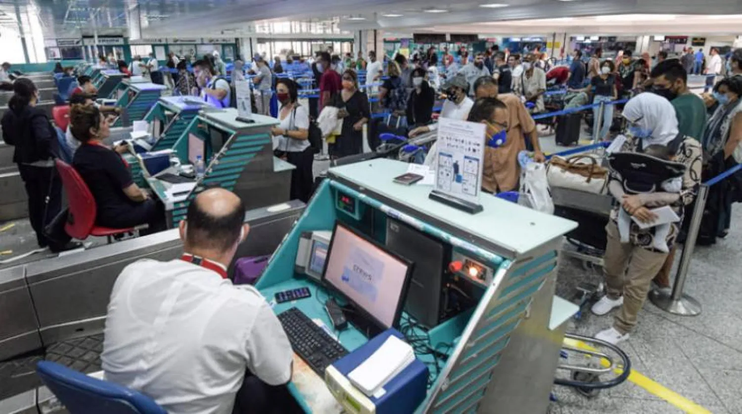 Travelers at the Tunis-Carthage International Airport. (AFP)