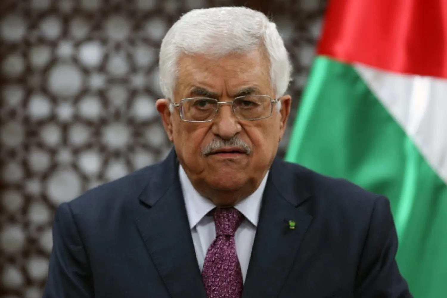 Palestinian President Mahmoud Abbas speaks during a press conference on October 8, 2014, in the West Bank city of Ramallah. AFP PHOTO/ABBAS MOMANI 
