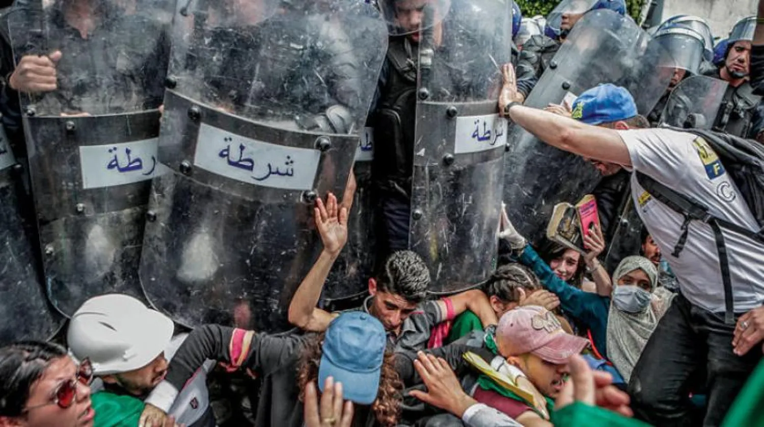 Algerian protesters clash with police during a protest in 2019. AP file photo