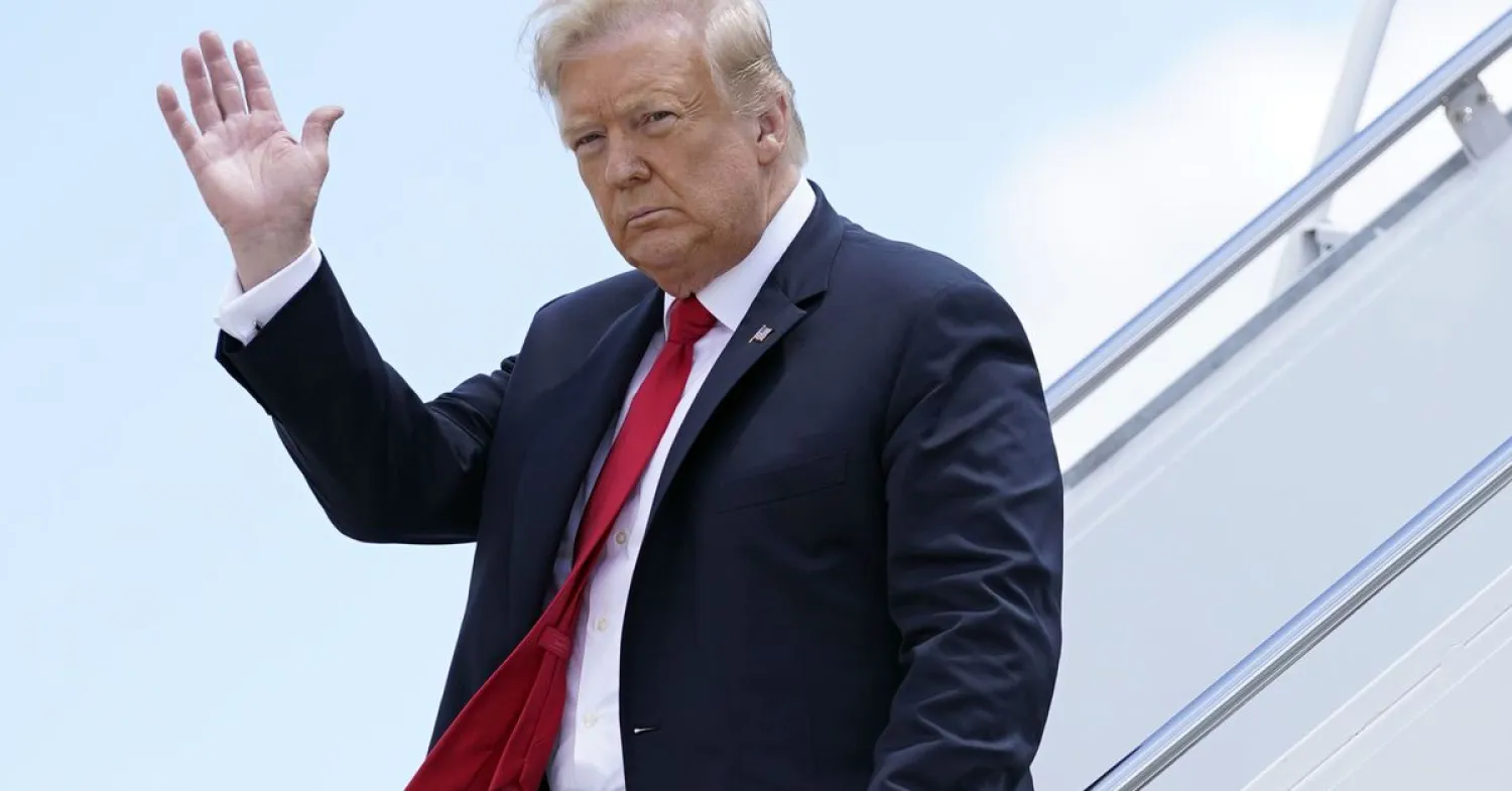  In this Thursday, June 25, 2020 file photo, President Donald Trump waves as he arrives on Air Force One at Austin Straubel International Airport in Green Bay, Wis. (AP Photo/Evan Vucci, File)