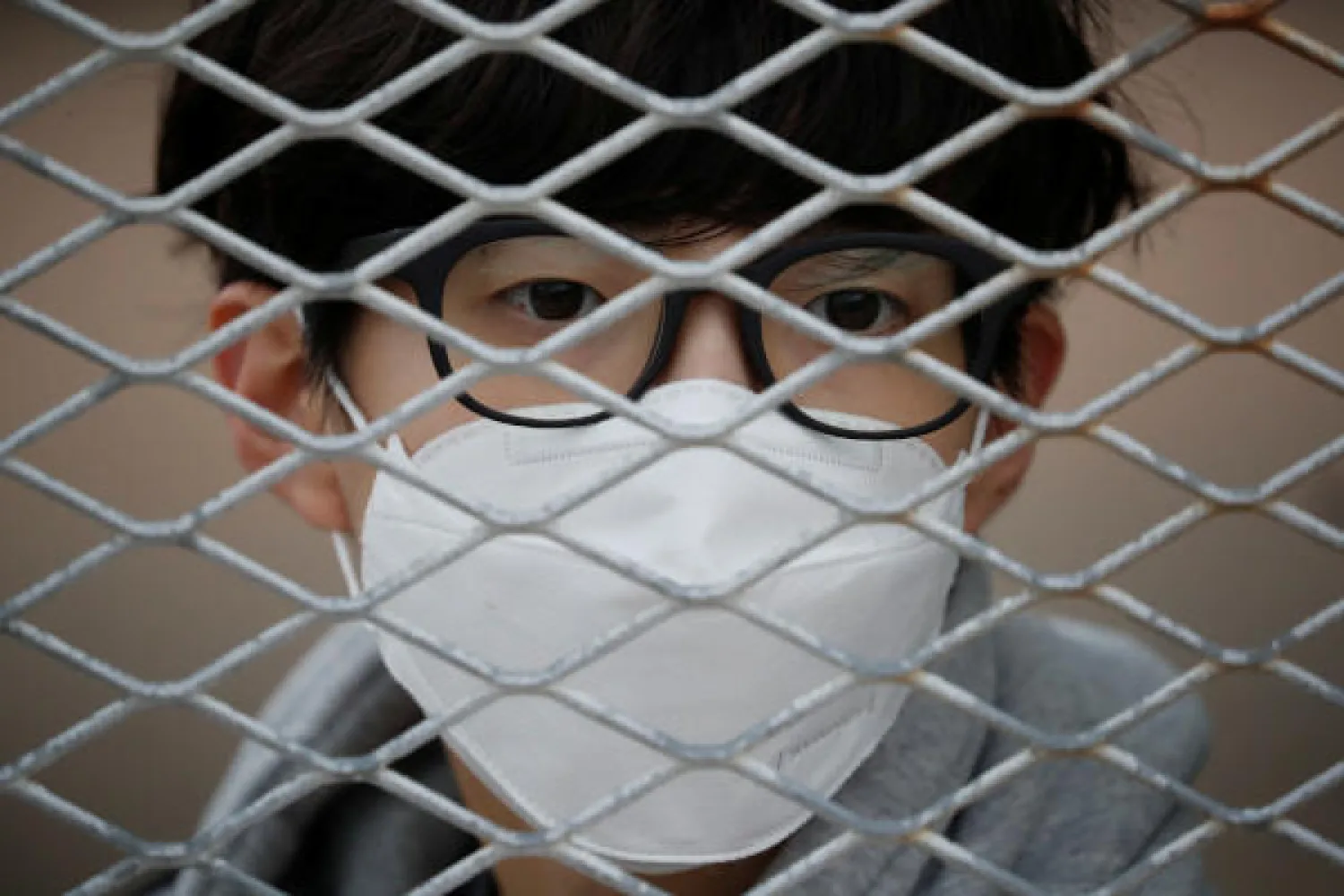 Munhak Baseball Stadium, Incheon, South Korea - May 5, 2020 A SK Wyverns fan wearing a protective face mask during the match, despite most sports being cancelled around the world the local league starts behind closed doors due to the spread of the coronavirus disease (COVID-19) REUTERS/Kim Hong-Ji