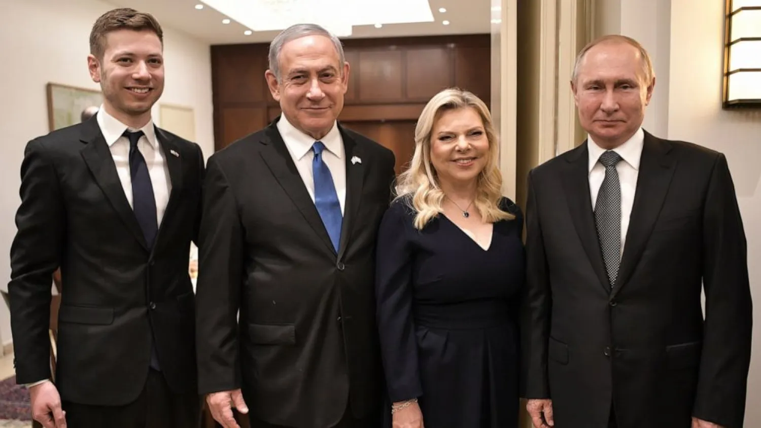  In this Jan. 23, 2020 file photo, Israeli Prime Minister Benjamin Netanyahu, 2nd left, his wife Sara, son Yair, left, and Russian President Vladimir Putin pose during a meeting, in Tel-Aviv, Israel, ahead of the World Holocaust Forum. (Aleksey Nikolskyi, Sputnik Kremlin Pool Photo via AP, File)