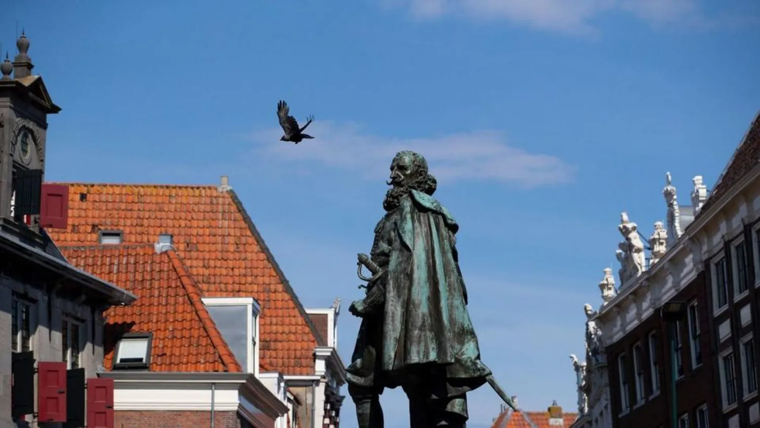 A statue of the Dutch Golden Age trader and brutal colonialist Jan Pieterszoon Coen stands tall above a square in his hometown of Hoorn, north of Amsterdam, Netherlands, Friday, June 19, 20202. (AP Photo/Peter Dejong)