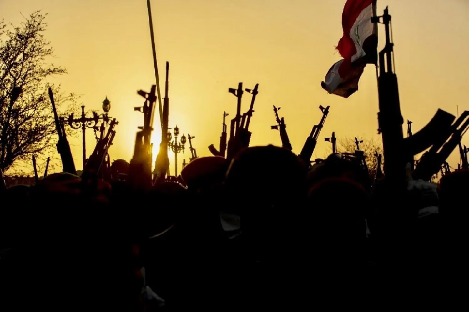 Members of the PMF take part in parade in southern Iraqi city of Basra. (AFP file photo)