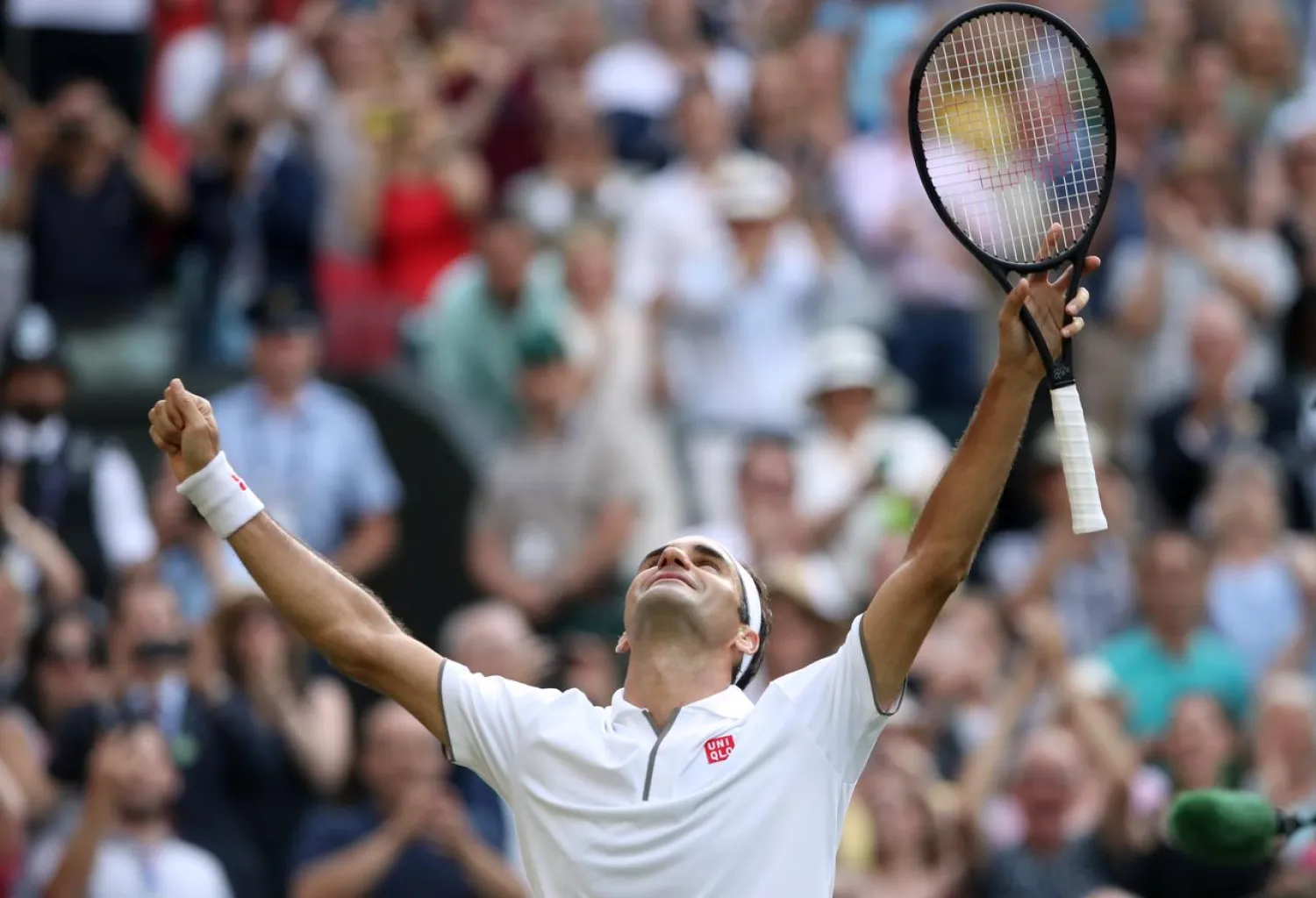 Switzerland's Roger Federer celebrates after winning his semi-final match against Spain's Rafael Nadal at Wimbledon on July 12, 2019. (Reuters)
