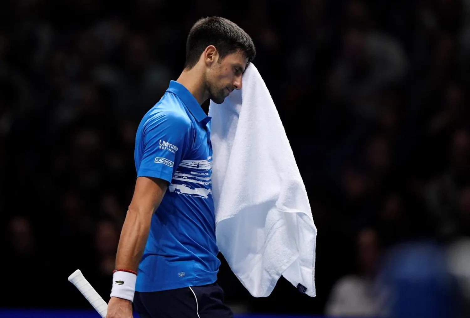 FILE PHOTO: Tennis - ATP Finals - The O2, London, Britain - November 14, 2019 Serbia's Novak Djokovic during his group stage match against Switzerland's Roger Federer. Action Images via Reuters/Tony O'Brien