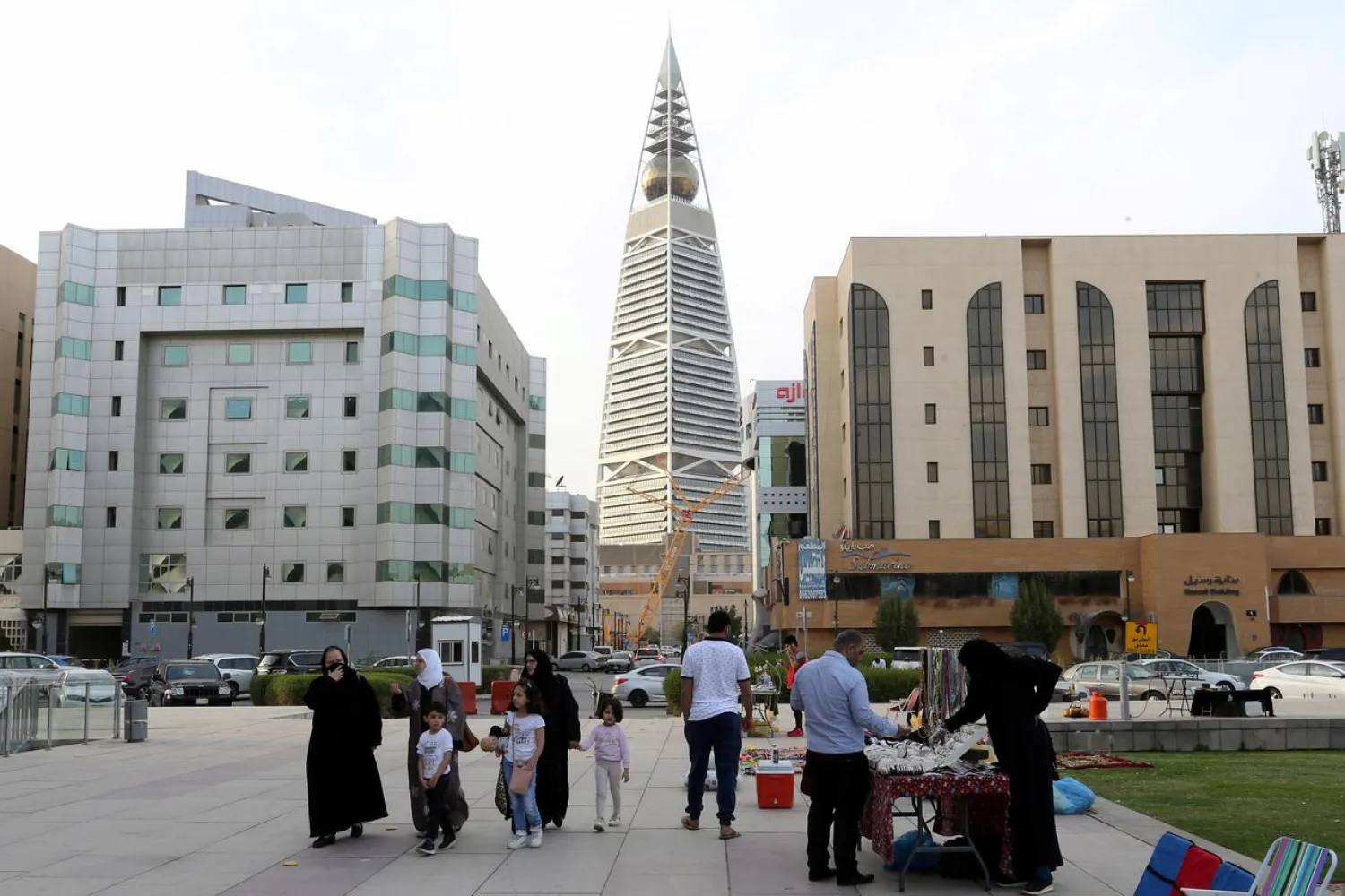 Visitors walk near the King Fahd Library, following an outbreak of coronavirus, in Riyadh, Saudi Arabia March 12, 2020. REUTERS/Ahmed Yosri