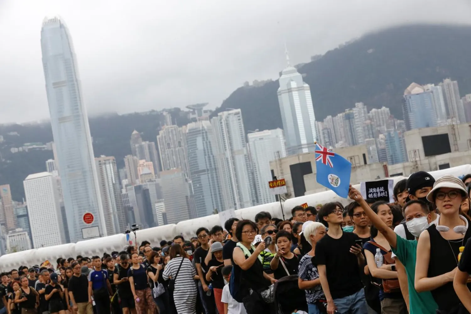Anti-extradition bill protesters march to West Kowloon Express Rail Link Station in Hong Kong, China July 7, 2019. REUTERS/Thomas Peter