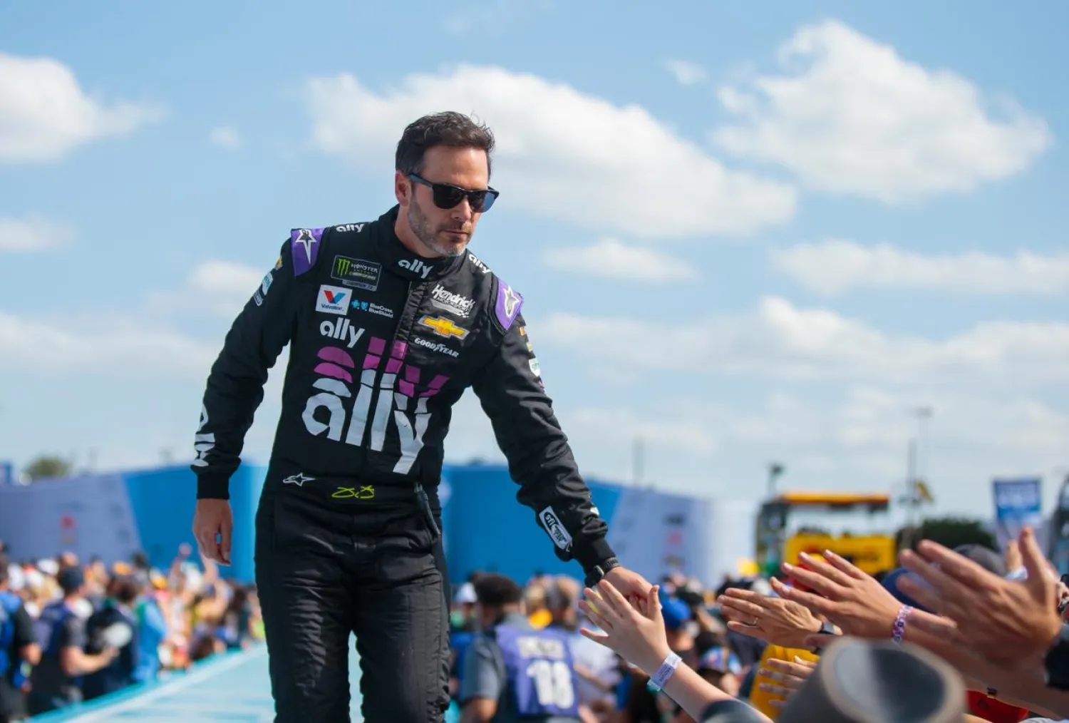 FILE PHOTO: Feb 17, 2019; Daytona Beach, FL, USA; NASCAR Cup Series driver Jimmie Johnson prior to the Daytona 500 at Daytona International Speedway. Mandatory Credit: Mark J. Rebilas-USA TODAY Sports/File Photo