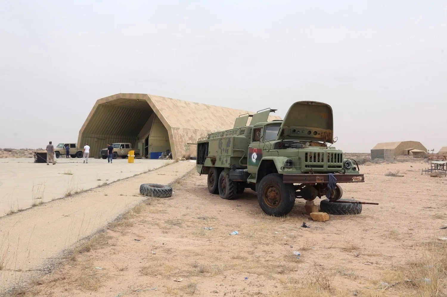 GNA members are seen after taking control of al-Watiya airbase, southwest of Tripoli, Libya, May 18, 2020. Reuters