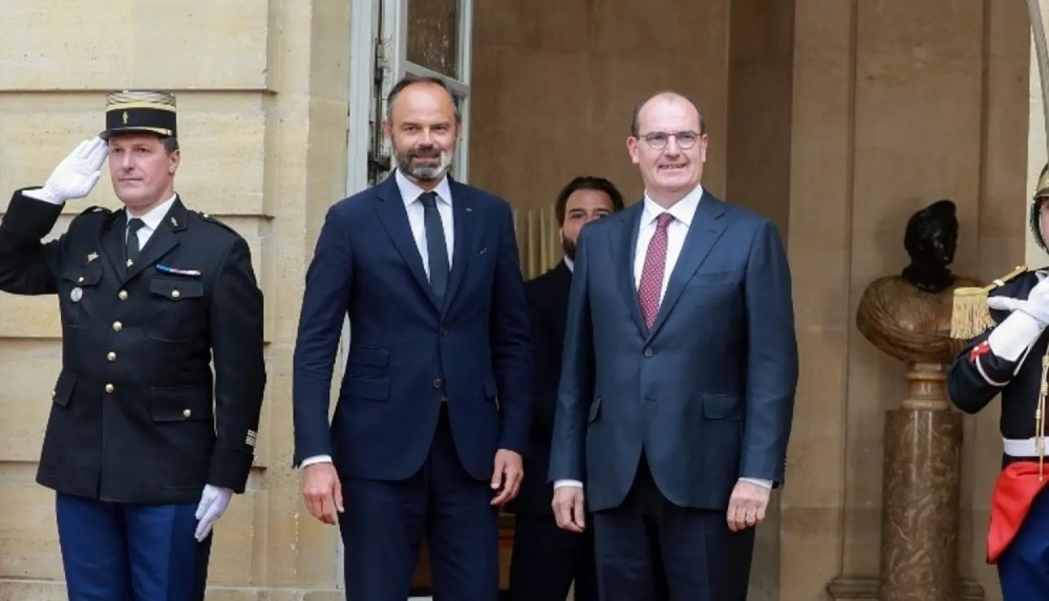 Jean Castex (right) takes over from Edouard Philippe (left) as France's prime minister. (AFP)