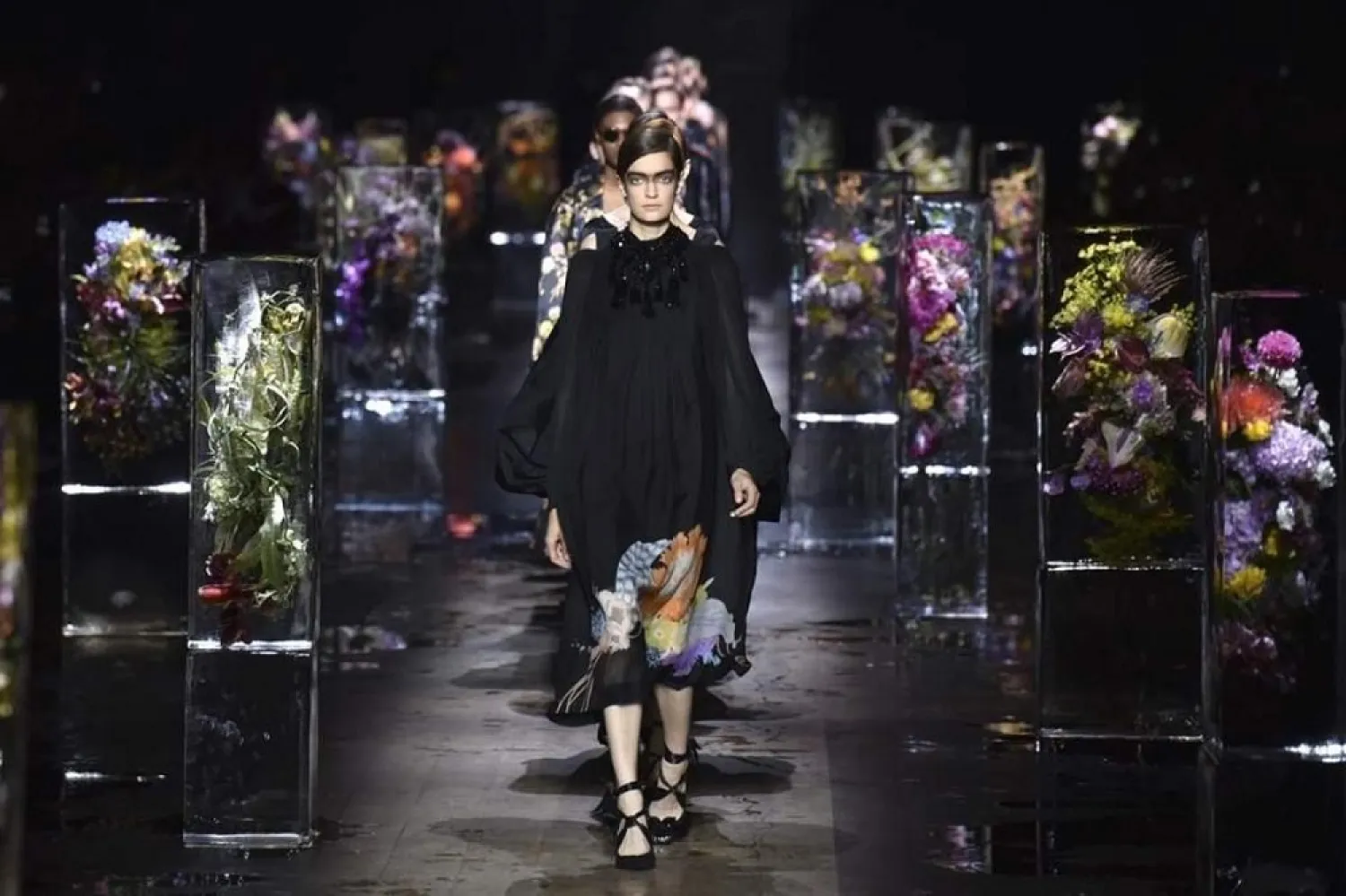 Paris fashion week- Models wear creations by Belgian fashion designer Dries van Noten's Spring-Summer collection. (AP)