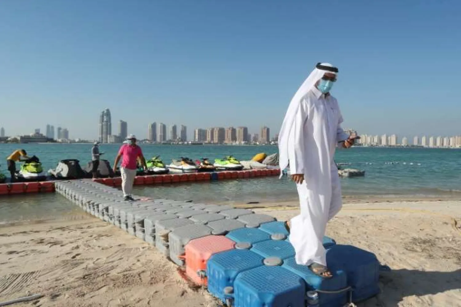 Qatar, where beaches reopened on July 1, has one of the world's highest per capita infection rates with 3.65 percent of its 2.75 million population having tested positive for COVID-19 | AFP