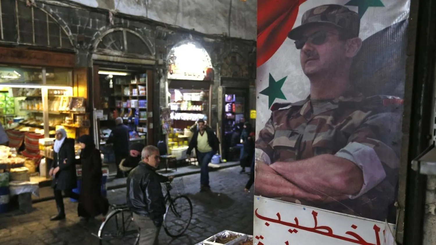A poster of Syrian president Bashar Assad in the Old City of Damascus. (AFP)