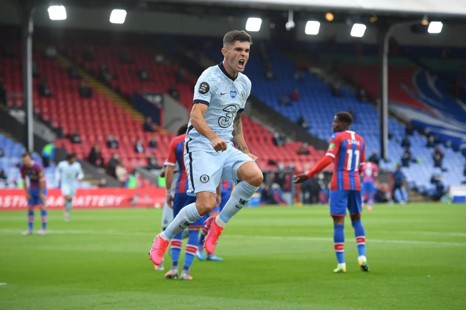 Chelsea's Christian Pulisic celebrates scoring their second goal against Crystal Palace on Tuesday. (Reuters)