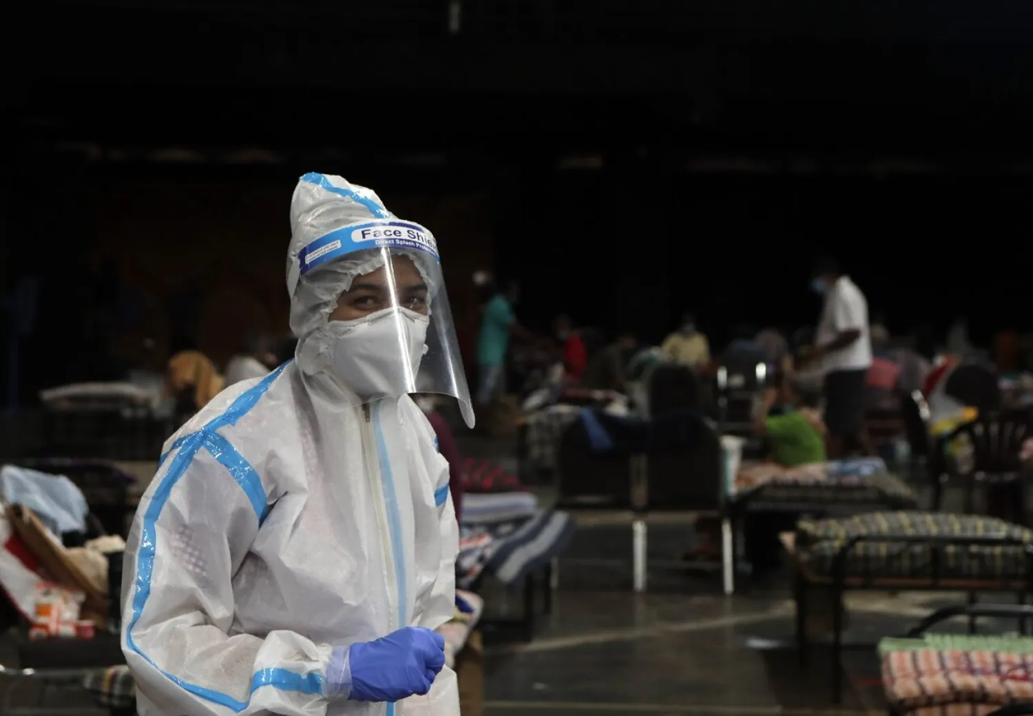 A doctor works at a COVID-19 isolation center in Mumbai, India, Wednesday, July 8, 2020. India has overtaken Russia to become the third worst-affected nation by the coronavirus pandemic. (AP Photo/Rajanish Kakade)