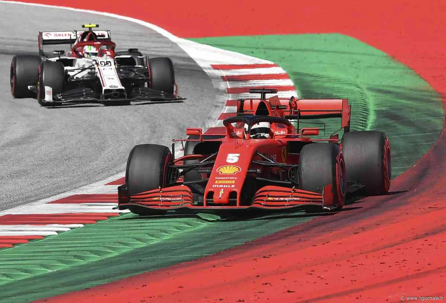 Ferrari driver Sebastian Vettel of Germany steers his car followed by Alfa Romeo driver Antonio Giovinazzi of Italy during the Austrian Formula One Grand Prix at the Red Bull Ring racetrack in Spielberg, Austria, Sunday, July 5, 2020. (Joe Klamar/Pool via AP)