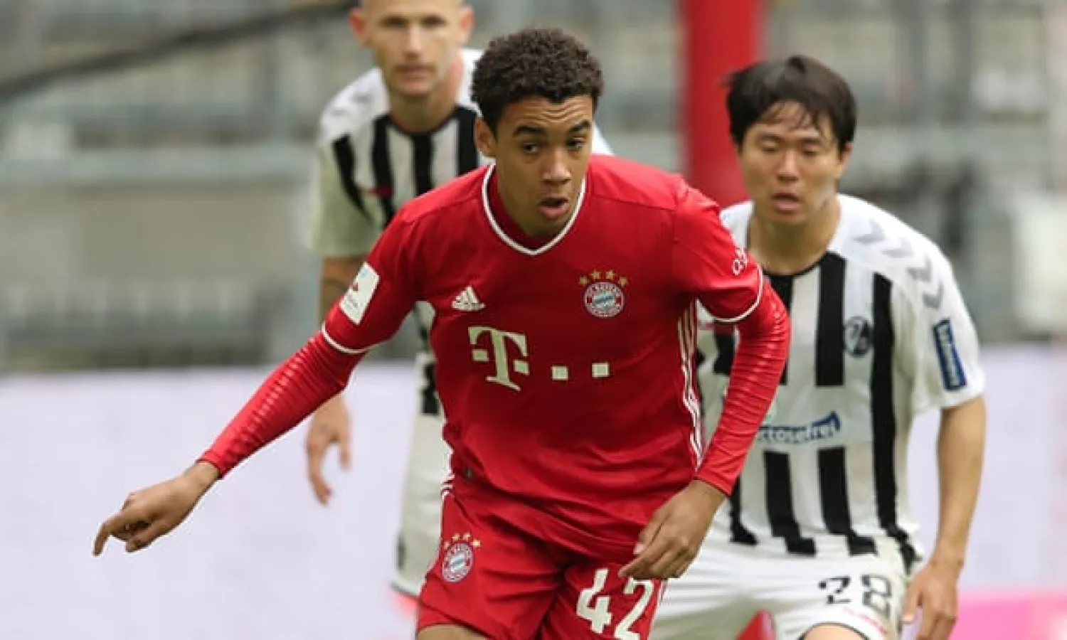  Jamal Musiala on his Bayern Munich debut against Freiburg on 20 June, when he became the club’s youngest player to appear in the Bundesliga. Photograph: Alexander Hassenstein/Getty Images
